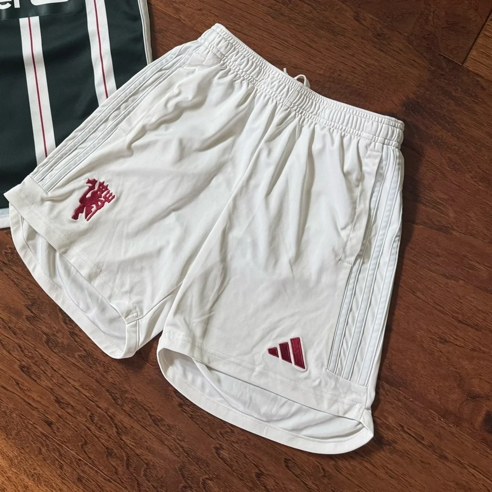 White Adidas Soccer Shorts with Red Manchester United Logo, size Medium 11-12Y